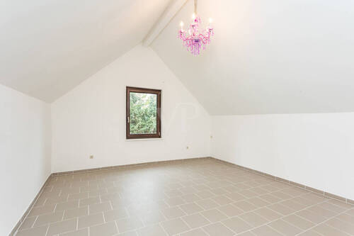 Schlafzimmer zwei im Dachgeschoss - 