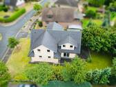 Luftbild - 9 Zimmer Einfamilienhaus zum Kaufen in Nienhagen