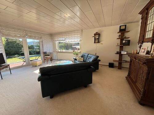 Wohnzimmer - Einfamilienhaus in Syke, 6 Zimmer, 2 Bäder, Vollkeller, Garage