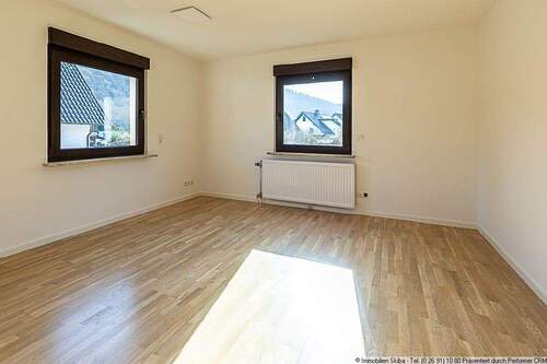 Wohnzimmer EG - 5 Zimmer Einfamilienhaus zur Miete in Hönningen