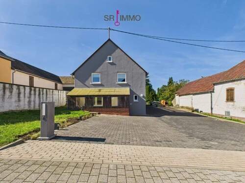 Bild 2 - 6 Zimmer Einfamilienhaus zum Kaufen in Bauler