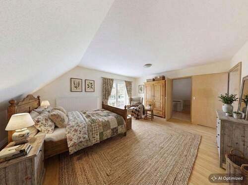 [KI-optimiertes Foto] Schlafzimmer 1 im Dachgeschoss - 