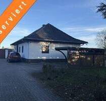 Dörverden-Hülsen: Charmanter Walmdachbungalow mit Keller, Garage und Carport auf großem Grundstück - Dörverden / Hülsen