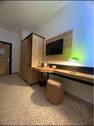 Arbeitsbereich im Gästezimmer mit TV - 