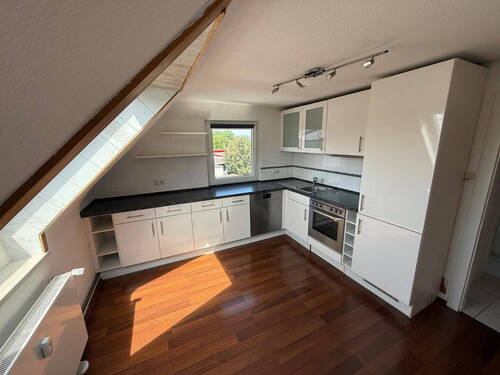 Bild 1 - Dachgeschosswohnung in super Lage mit kleiner Oase, Gemeinschaftsgarten
