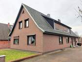 Bild 2 - 8 Zimmer Mehrfamilienhaus, Wohnhaus zum Kaufen in Wilstedt