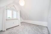 Schlafzimmer zwei im Dachgeschoss - 
