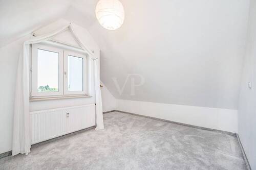 Schlafzimmer zwei im Dachgeschoss - 
