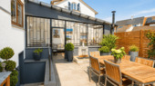 Terrasse mit Beschattung und Zugang zum Wintergart - *Stadtnahes 3-Familien-Domizil in begehrter Lage*