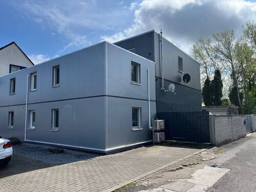 Vorder-/Seitenansicht - 8 Zimmer Mehrfamilienhaus, Wohnhaus zum Kaufen in Kamen