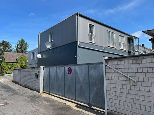 elektr. Rolltor_Seiten-/Rückansicht - Mehrfamilienhaus, Wohnhaus mit 231,00 m² in Kamen zum Kaufen