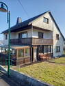 Seitenansicht mit Wintergarten - Freistehendes Ein bis Zweifamilienhaus am Waldrand im Westerwald