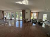 Wohnzimmer, rechts mit Kaminecke - Einfamilienhaus mit 237,50 m² in Nörvenich zum Kaufen