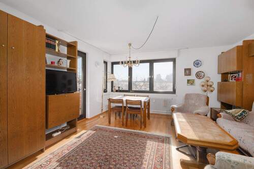 Wohnzimmer und Essbereich - 2 Zimmer Etagenwohnung zum Kaufen in Dobel