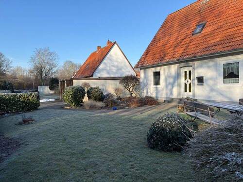 Garten vd Haus_1 - Einfamilienhaus mit 123,00 m&sup2; in Petershagen / Lahde zum Kaufen