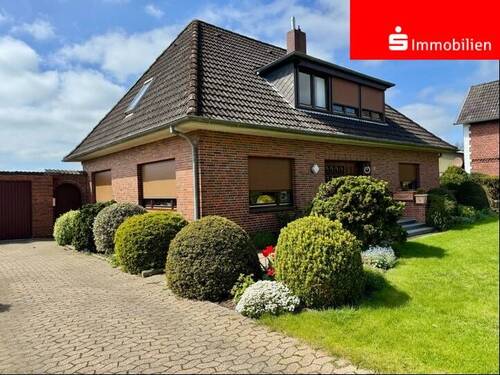 Ansicht - Grundsolides Familienhaus mit Platz !