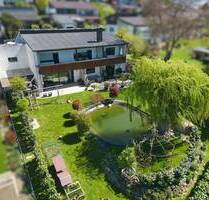 Stilvoll modernisiert & einzigartiger Garten mit Badeteich auf 1.040 m² Grundstück - Velden