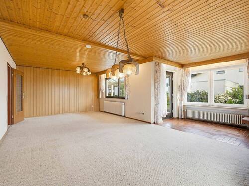 Wohnzimmer - 7 Zimmer Einfamilienhaus zum Kaufen in Oberteuringen