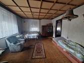Wohnzimmer - 3 Zimmer Einfamilienhaus zum Kaufen in Friedland