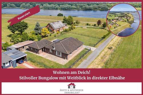 Ärzte & Apotheker Immobilien - Wohnen am Deich - stilvoller Bungalow mit Weitblick in direkter Elbnähe!