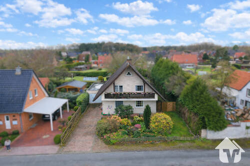 Vor­der­an­sicht - 5 Zimmer Einfamilienhaus zum Kaufen in Holte