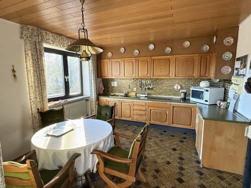 Küche mit Einbauküche am Wintergarten - 