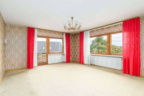Wohnzimmer EG Bild II - 6 Zimmer Einfamilienhaus in Triefenstein / Homburg am Main