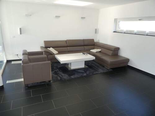 Wohnzimmer - 7 Zimmer Einfamilienhaus zum Kaufen in Bergkamen