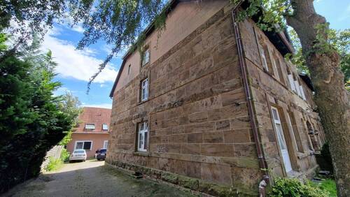 Seitenansicht - Mehrfamilienhaus, Wohnhaus zum Kaufen in Porta Westfalica