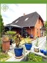 Ihr neues Zuhause? - **Ein grünes Familienrefugium mit vielen Möglichkeiten durch sep. Wohnbungalow (+ 65 qm Wfl.)!***