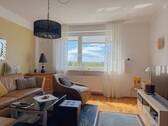 Wohnzimmer - 3 Zimmer Etagenwohnung in München