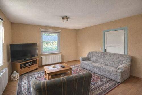 Wohnzimmer EG bearbeitet - 6 Zimmer Einfamilienhaus zum Kaufen in Balje