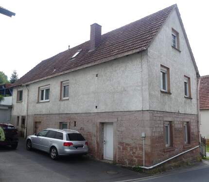 Straßenansicht links - Einfamilienhaus mit 110,00 m&sup2; in Aura zum Kaufen