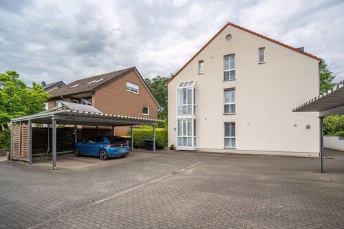 Großzügige 4-Zimmer-Eigentumswohnung mit Wintergarten und Carport - Großzügige 4-Zimmer-Eigentumswohnung mit Wintergarten und Carport in Steinhagen-Amshausen