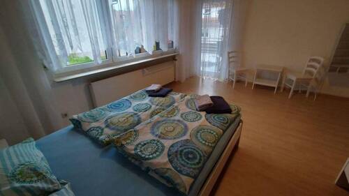Helles Schlafzimmer - Mehrfamilienhaus, Wohnhaus mit 256,00 m&sup2; in Winnenden zum Kaufen