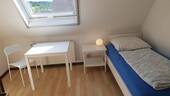 Zimmer mit Dachfenster - 