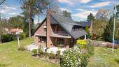 Gartenansicht - Gepflegtes Einfamilienhaus mit großzügigem Grundriss und Saunabereich in Maschen