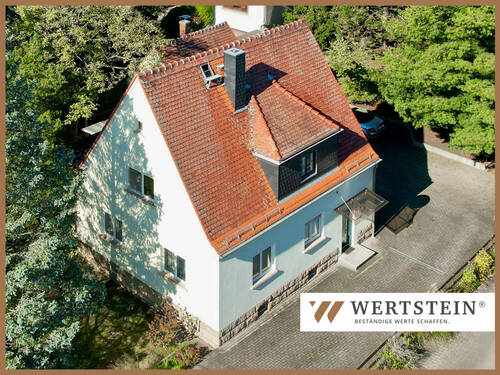 Außenansicht - Einfamilienhaus mit Baugrundstück