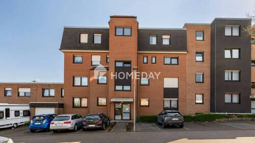 Außenansicht 2 - Charmante 2-Zimmer-Erdgeschosswohnung mit Balkon & Stellplatz - Wohnen mit Wohlfühlfaktor