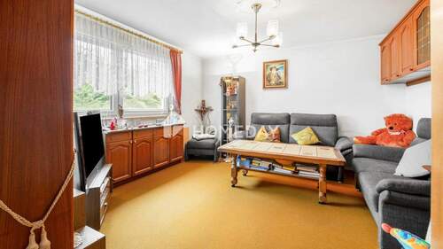 Wohnzimmer 1 - 4-Zimmer-Wohnung mit sonniger Loggia auf Erbpachtgrund - ruhig, gepflegt und gut geschnitten