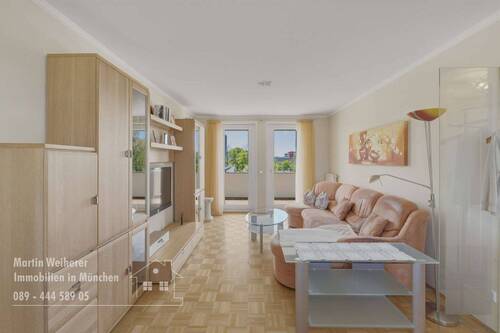 Wohnzimmer - Etagenwohnung mit 90,10 m&sup2; in Unterföhring zum Kaufen