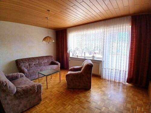 Wohnzimmer mit Balkon 2 EG - 