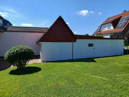 Ansicht drei Schuppen - Mehrfamilienhaus, Wohnhaus mit 210,00 m&sup2; in Vellmar zum Kaufen