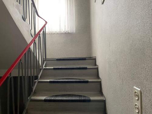 Treppe vom Erdgeschoss in das Obergeschoss - 