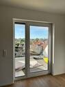 Wohnzimmer mit Ausgang zur Loggia - 