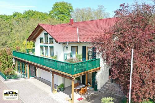 Haus - Vielseitiges Wohnensemble - Einfamilienhaus mit vermieteter ELW (Zweitwohnsitz) & Gästehaus