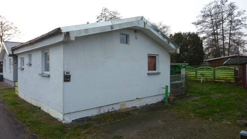 Seitenansicht - 3 Zimmer Mehrfamilienhaus, Wohnhaus zum Kaufen in Tespe