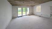 Raum im Erdgeschoss mit Terrassenzugang - 