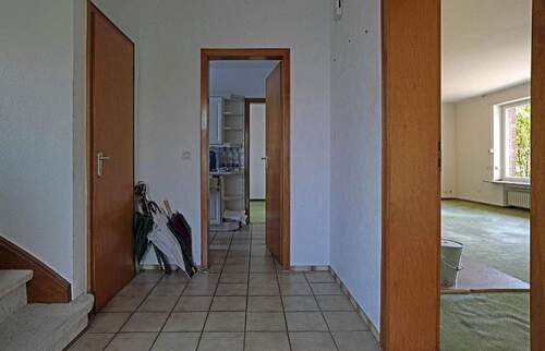Diele mit Durchgang zur Küche - Einfamilienhaus mit 110,00 m² in Bergisch Gladbach Bensberg zum Kaufen