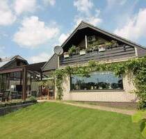 Bungalow mit großem Wintergarten und Einliegerwohnung im Dachgeschoss, Rheinberg-Ossenberg, mit großem Garten